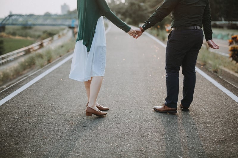 Couple holding hands